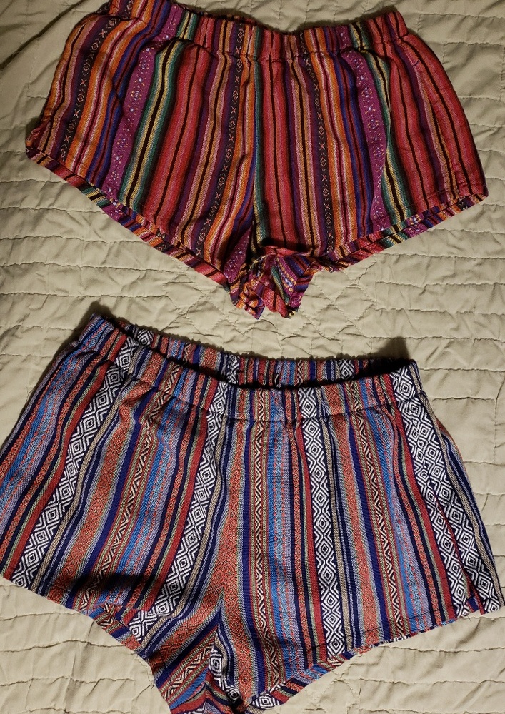 Two pair of short shorts. Textured, tapestry like